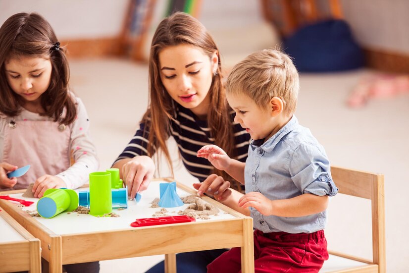 cute-girl-sitting-table_1048944-15441062